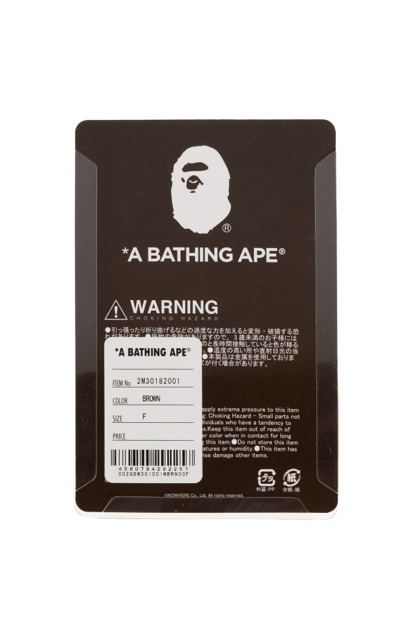 A BATHING APE® Keychain with a monkey motif
