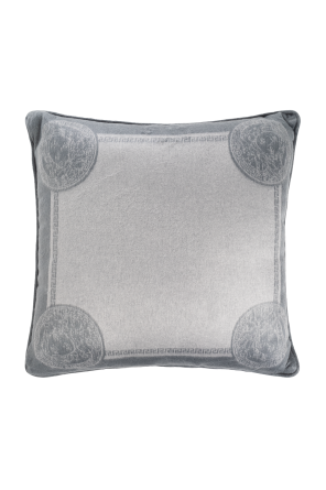 Cushion with medusa face od Versace Home