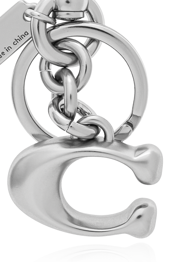 Coach Keychain with a pendant in the shape of a logo