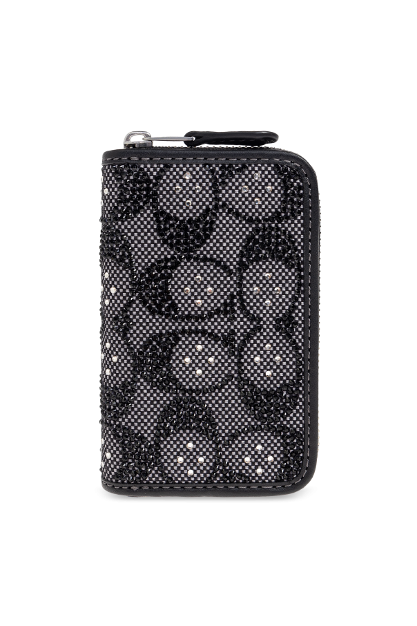 Clutch bag with shimmering crystals od Coach