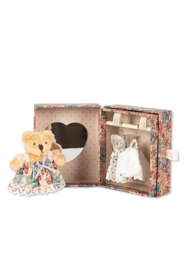 Plush teddy bear in a wardrobe with accessories od Konges Sløjd