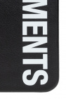 VETEMENTS Black iPhone 12 Pro case with a white logo from VETEMENTS