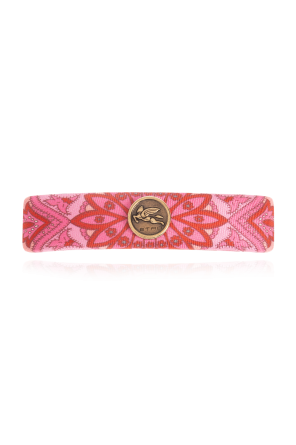 Hair clip with logo-shaped applique