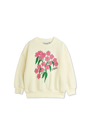 Blouse with a colorful embroidered floral motif