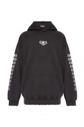 Enhance your collection with this Face Logo Hoodie from