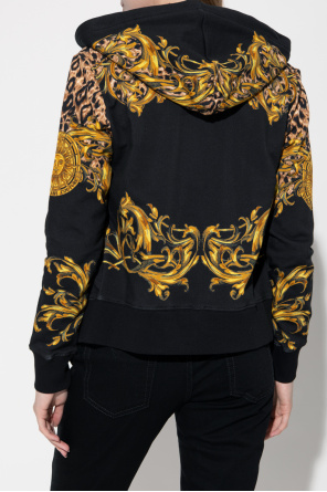 Stand out in style and comfort with the ® 1 2 Zip Cropped Sweatshirt Hoodie with ‘Garland Sun’ motif