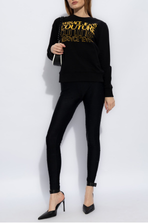 coordinating sweatshirt in cherub print od Versace Jeans Couture