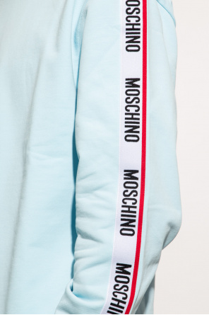 Moschino line which includes a cozy sweater
