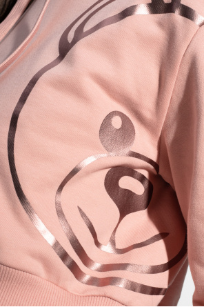 Moschino This cotton-blend piqué Polo shirt wicks away moisture to keep you cool