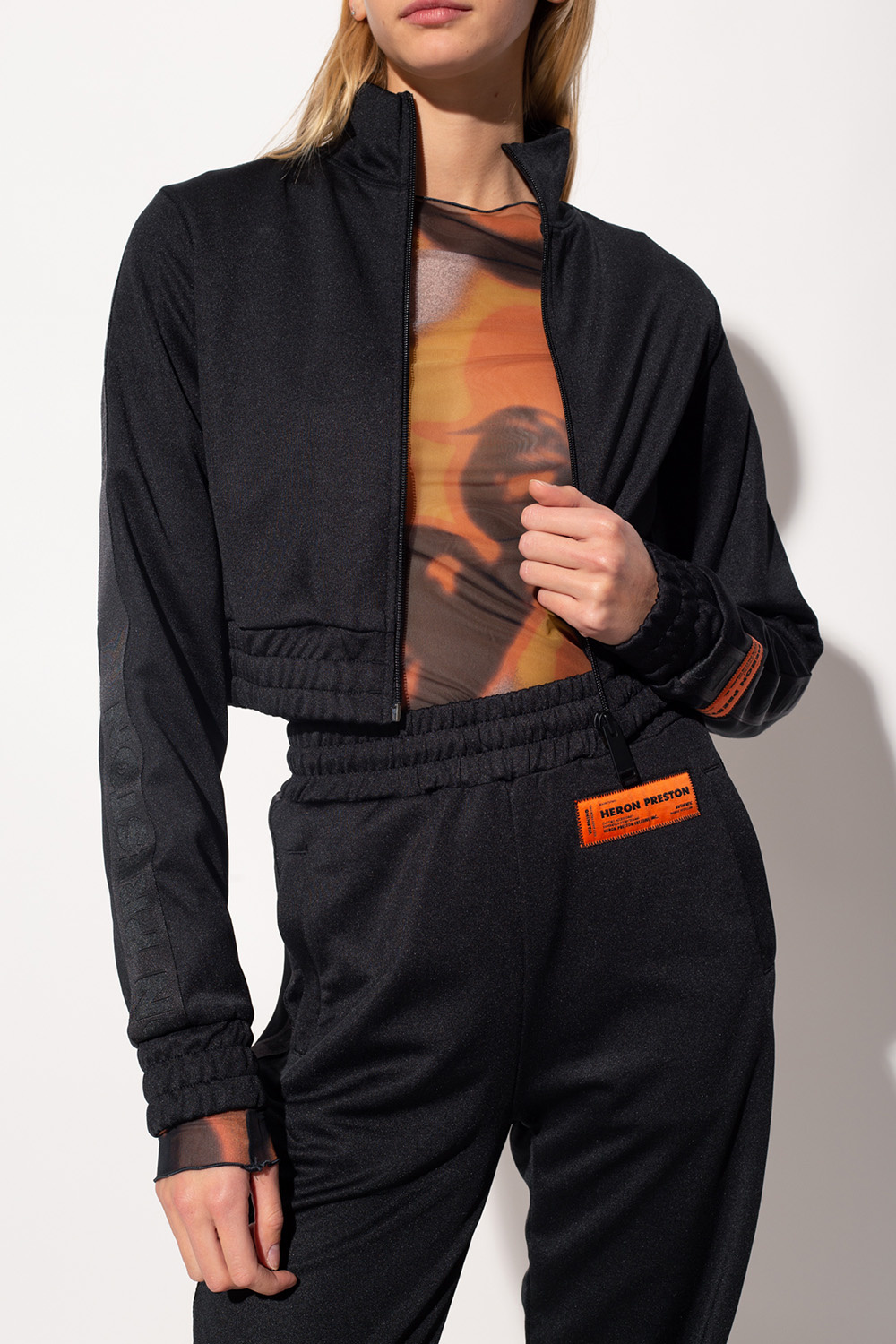 Heron Preston The mens collection includes androgenic shirts