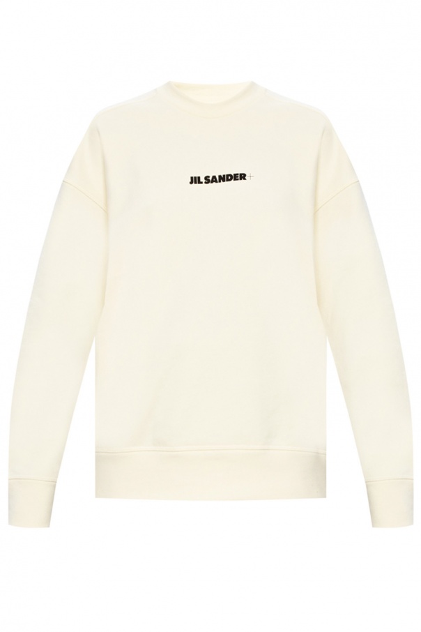 cream crewneck sweatshirt