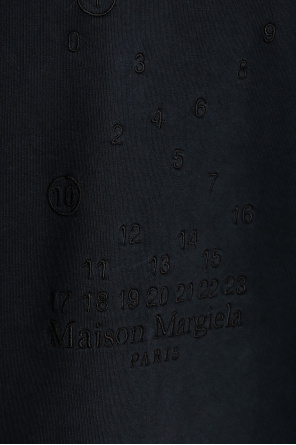 Maison Margiela Dieses schwarze T-Shirt mit Rundhalsausschnitt ist von