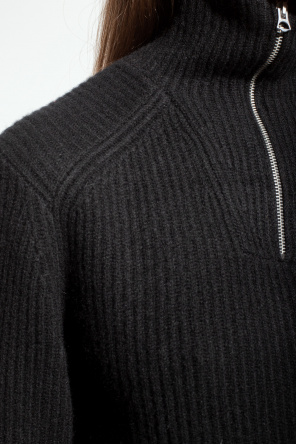 The capsule collection comprises of three t-shirts  Cashmere turtleneck sweater