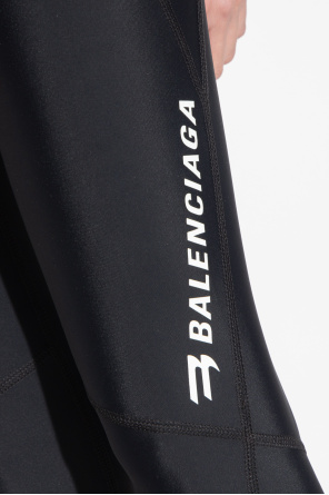 Balenciaga Black jumpsuit with adjustable shoulder straps and a white logo print from