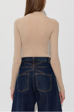 Alaïa Bodies with a turtleneck