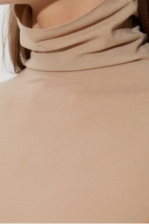 Alaïa Bodies with a turtleneck