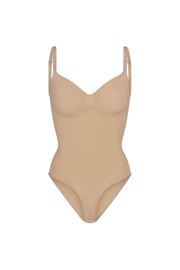 Shaping bodysuits od SKIMS