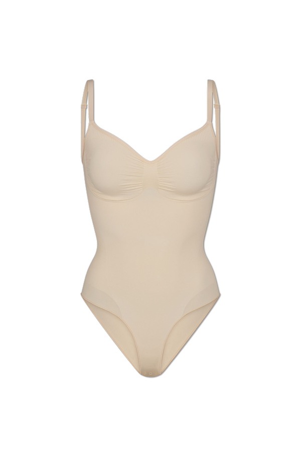 Shaping bodysuits od SKIMS