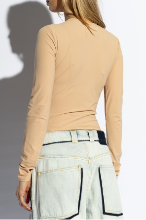 Maison Margiela with a relaxed polo shirt for a look that will take you from day to night