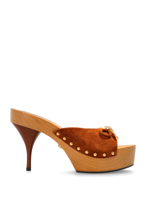 Platform slides with Medusa head