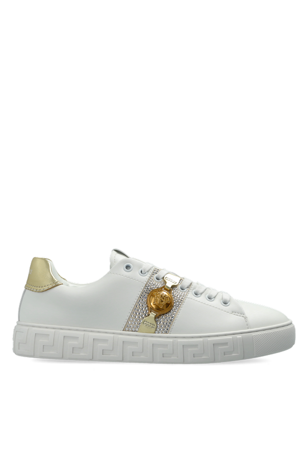Sports shoes with applications od Versace