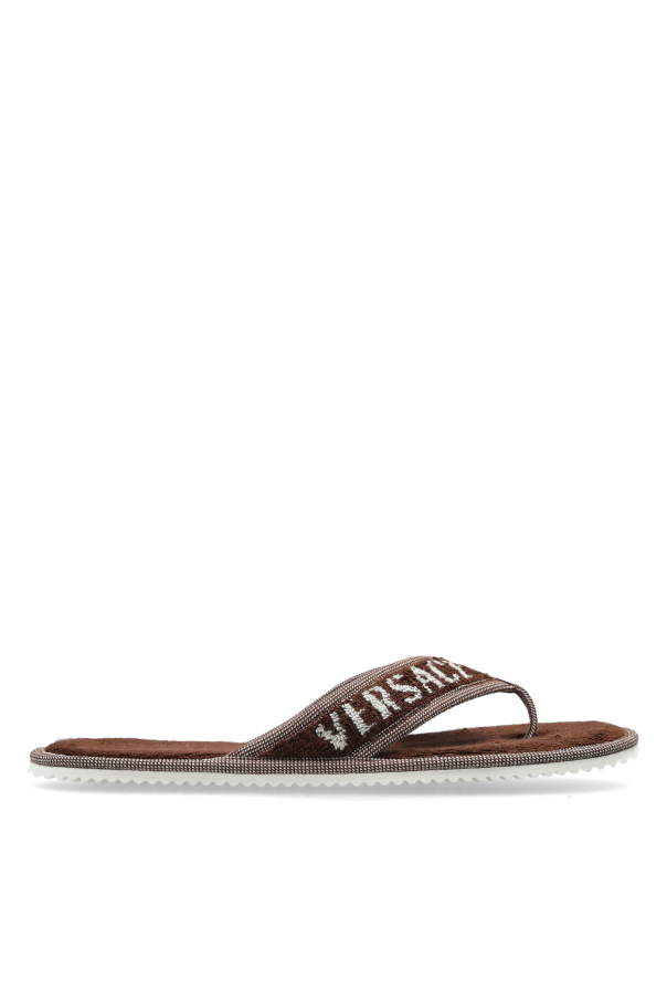 Slides with logo od Versace Home