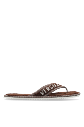 Slides with logo od Versace Home