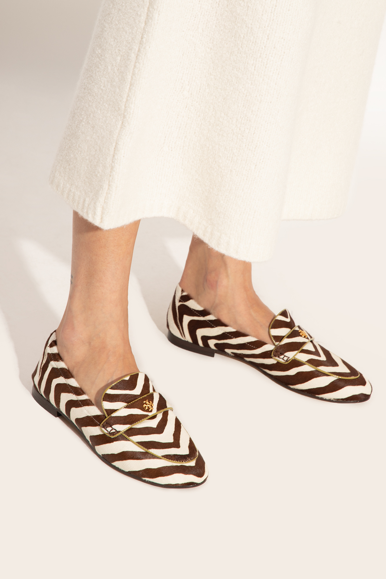 Tory Burch Accentuate your warm-weather look wearing the ® Magnitude Sandal