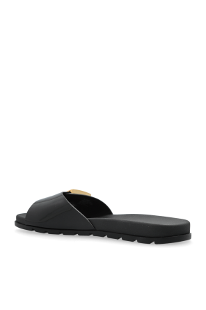 Tory Burch Flip-flops with a logo-shaped buckle