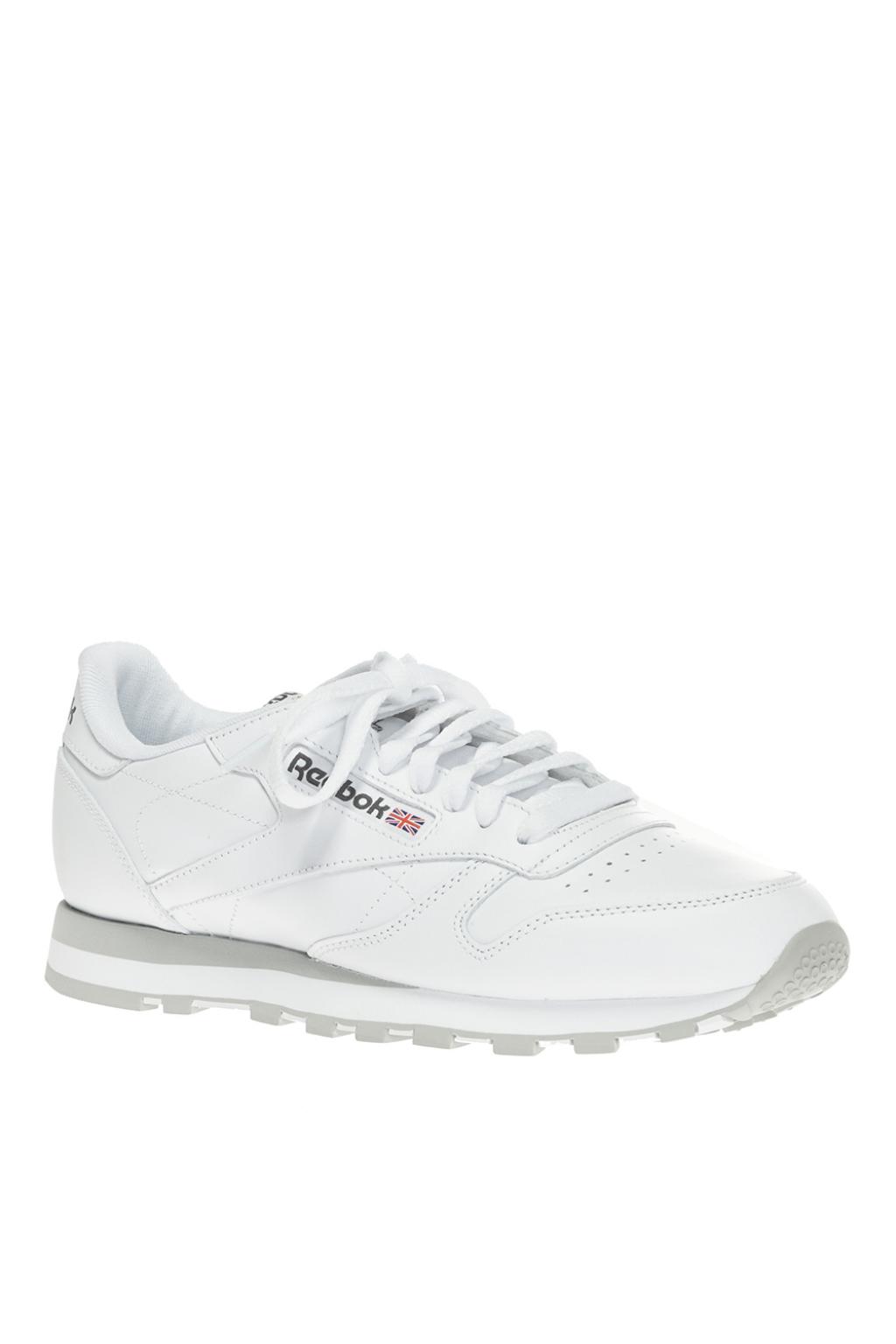 white classic reebok sneakers