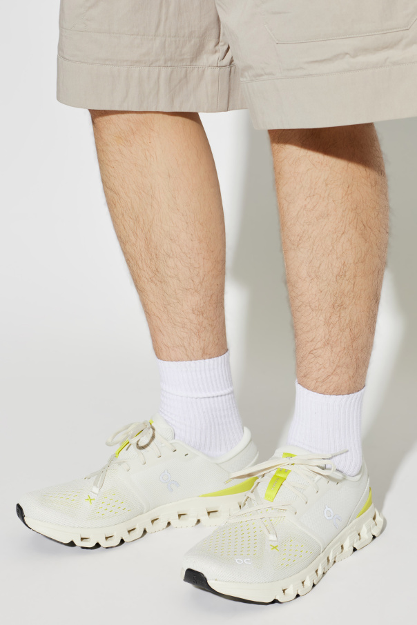 On "Cloud X4" sports shoes