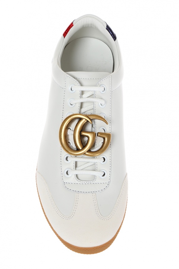 gucci metal logo