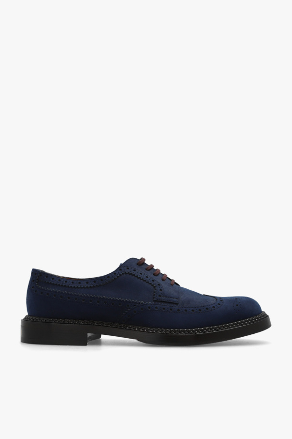 Shoes with brogue details od Gucci