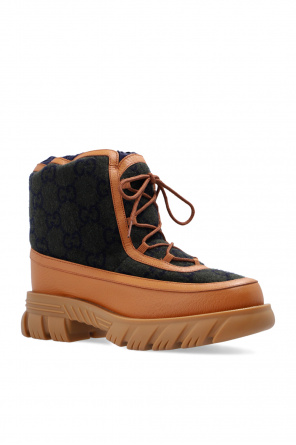 Gucci Monogrammed snow boots