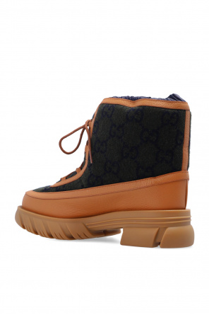 Gucci Monogrammed snow boots