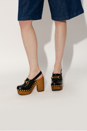 Leather heeled clogs od Gucci