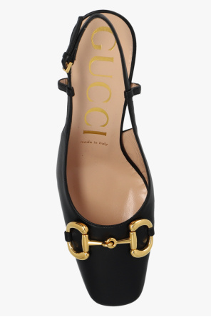 gucci gold Leather pumps