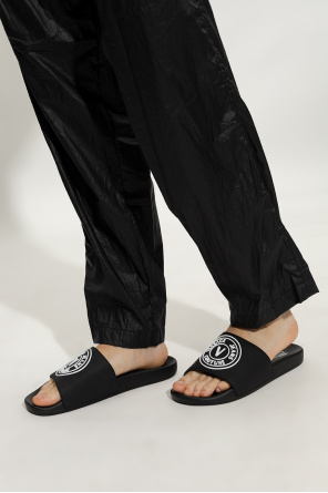 Slides with logo od Versace toile jeans Couture