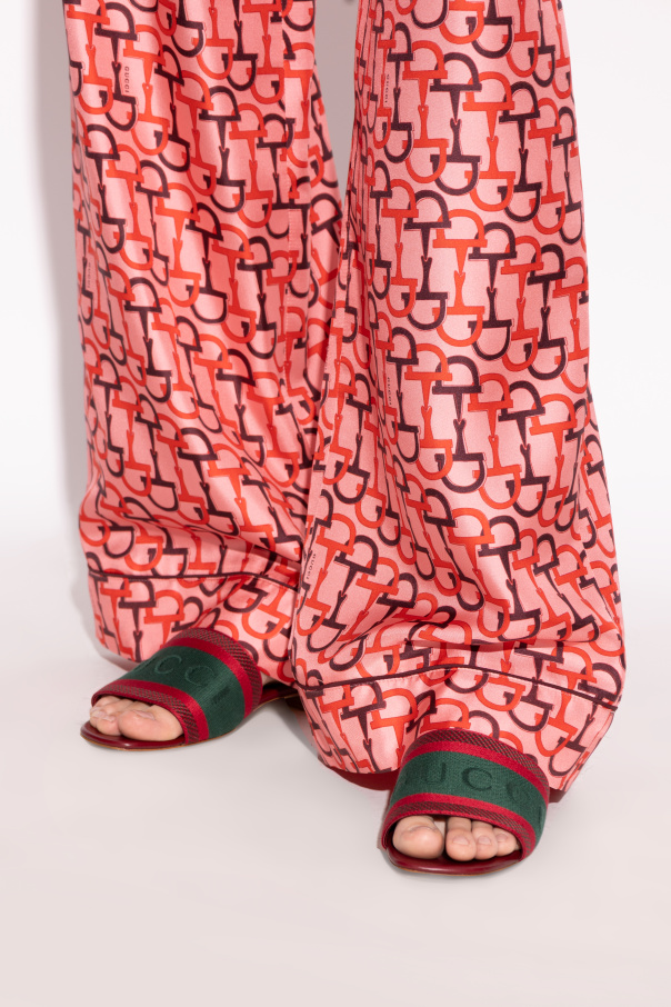 Gucci Slides with distinctive Web strap