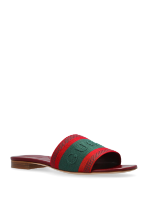 Gucci Slides with distinctive Web strap