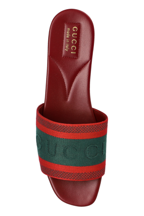 Gucci Slides with distinctive Web strap