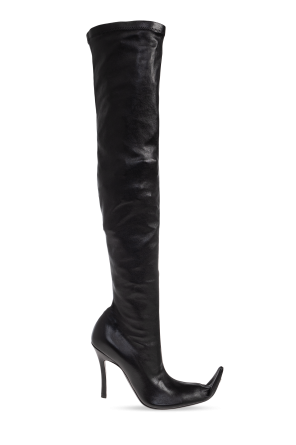 Heeled boots `Poulaine`