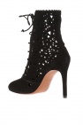 Alaia Heeled boots with an openwork pattern