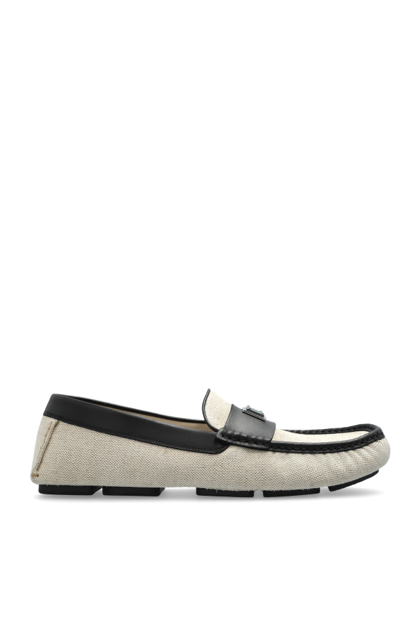 Loafers with an appliqué featuring an engraved logo od Dolce & Gabbana