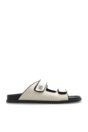 Slides with a logo-shaped applique