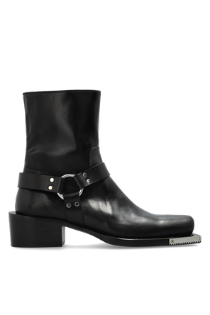 Botas de cowboy em pele