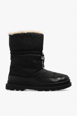 Monogrammed snow boots od Coach
