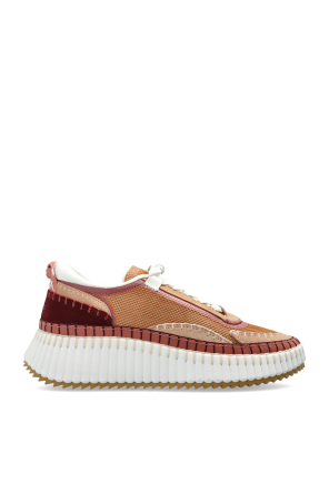 Sports shoes on a 'Nama' platform