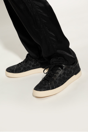 Monogrammed sneakers od Coach