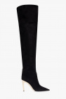 Kylie Jenner wearing Kurt Geiger patent thigh-high boots